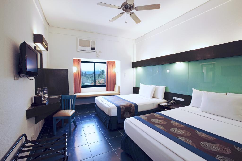 Microtel By Wyndham Puerto Princesa Bagian luar foto